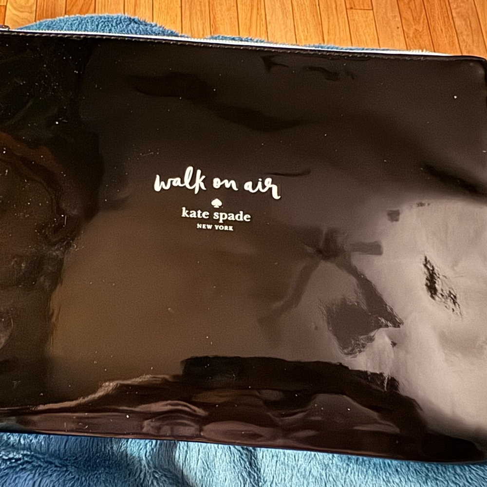 Great used condition Kate Spade case. Glare is from light. No flaws